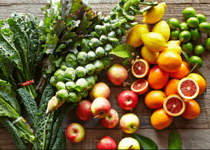 a group of fruits and vegetables on a wood surface Healthy Weight Loss Diets Oxshott
